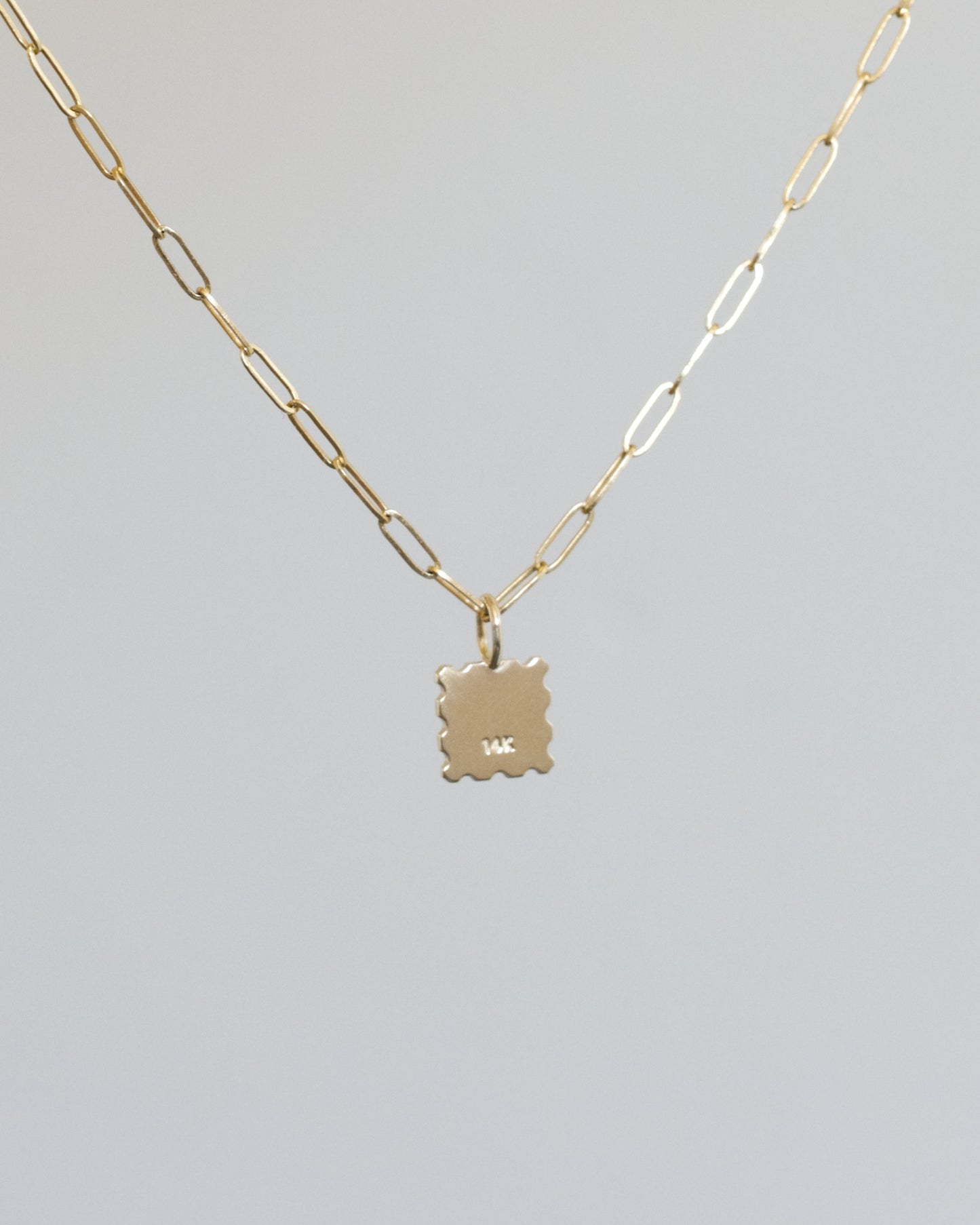 00 gold charm - mini heart post stamp